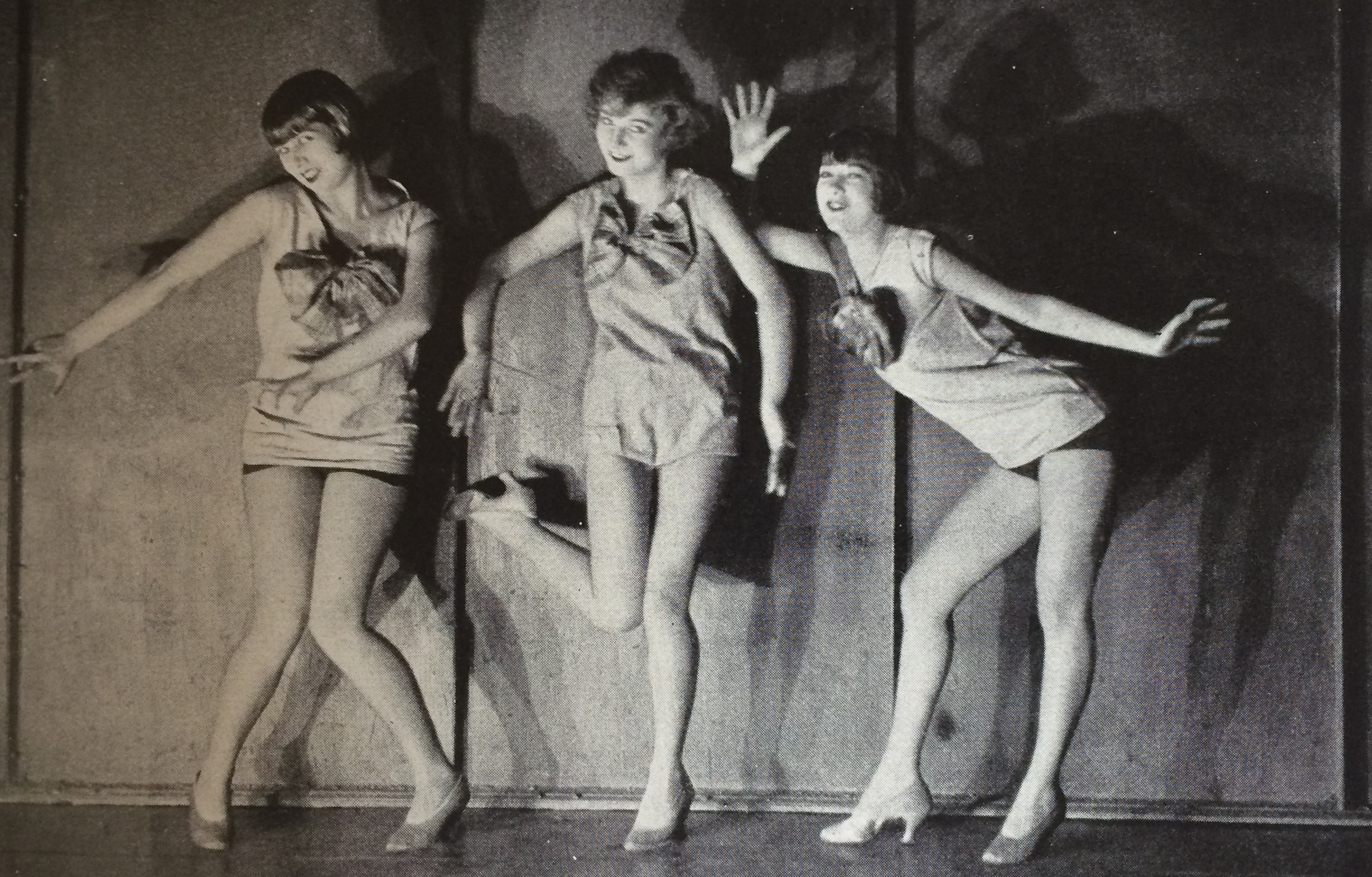 The sisters with an unknown girl at the centre (she is possibly Mlle. Florayne) in a performance in paris in 1927, photographed by James Abbe.